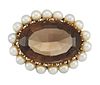 A CITRINE AND CULTURED PEARL BROOCH
 Centred by an