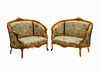 A Pair of Louis XV Style Giltwood Petit Canapes
Height 37 x length 48 x depth 28 inches.