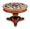 A Charles X Part Ebonized Cherrywood and Specimen Marble Center Table
Height 28 x diameter 38 inches.