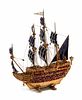 A Continental Jeweled Silvergilt and Enamel Model of a Galleon
Height 19 x length 15 1/2 x depth 6 inches.
