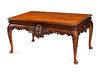 A George II Style Carved Mahogany Low Table
Height 24 x length 48 x depth 30 1/2 inches.
