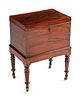 A Late George III Mahogany Cellarette on Stand
Height 26 1/2 x width 19 1/2 x depth 13 1/2 inches.