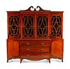 A George III Style Mahogany Breakfront Bookcase
Height 91 x length 93 x depth 22 inches.