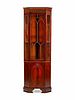A George III Style Mahogany Corner Cabinet
Height 96 x width 30 x depth 21 inches.