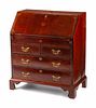 A George III Inlaid Mahogany Slant-Front Desk
Height 42 x width 38 x depth 20 1/2 inches.