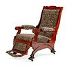 A Victorian Inlaid Mahogany Reclining Armchair
Height 41 x width 23 x depth 34 inches.