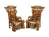A Pair of Egyptian Revival Style Parcel-Gilt and Polychromed Throne Chairs
Height 54 1/2 x width 34 x depth 31 inches.