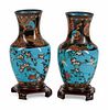 A Pair of Japanese Cloisonne Vases
Height 15 1/2 x diameter 7 inches.