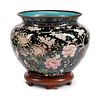 A Japanese Cloisonne Jardiniere
Height 16 1/2 x diameter 18 inches.