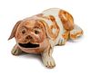 A Chinese Export Porcelain Figure of a Recumbent Dog
Height 2 1/2 x length 7 1/2 x depth 4 inches.