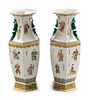 A Pair of Chinese Polychromed Porcelain Hexagonal Vases
Height 22 x width 8 1/2 x depth 8 1/2 inches.