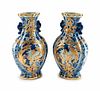 A Pair of Gilt-Decorated Chinese Blue and White Porcelain Vases
Height 15 x width 8 x depth 6 inches.