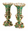 A Pair of Paris Porcelain Two-Handled Vases on Stands
Height 15 x diameter 7 1/2 inches.