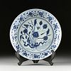 A MING DYNASTY STYLE BLUE AND WHITE LOTUS CHARGER, 19TH CENTURY,