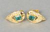 Pair of gold, emerald, and diamond earrings centering two emeralds, approximately 1.50 carats accented by diamonds, approximately .10 carats.