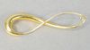 18 karat gold pin in the form of a figure eight, signed M. Good, 5.6 grams.