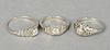 Three 18 karat white gold rings set with diamonds, 7.5 grams total weight, sizes 5.5, 8, 4.5.