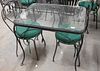 Six piece lot to include two outdoor glass top tables with four chairs, ht: 29", top: 24" x 32".