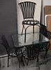Five piece lot to include outdoor glass top table with four chairs, ht: 29", top: 24" x 32".