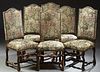 Set of Six Louis XIII Style Carved Beech Dining Chairs, 19th c., the arched crestrail above a canted back and trapezoidal seat, on s...