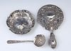 Three Pieces of Sterling, 20th c., consisting of an S. Kirk and Son repousse ladle with a floral relief handle; a Gorham Hand Mirror...