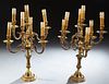 Pair of French Bronze Seven Light Candelabra, early 20th c., with a central raised candle arm flanked by six relief curved candle ar...