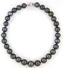 Graduated Strand of 29 Dark Grey Tahitian Cultured Pearls, ranging from 13-16 mm, with a 14K white gold ball clasp, L.- 17 in., with...