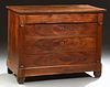 French Louis Philippe Carved Walnut Commode, c. 1860, the rectangular top over a freize drawer and three deep drawers, on a plinth b...