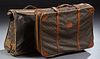 Two Vintage Louis Vuitton Suitcases, with the "LV" logo, one a folding hanging garment bag; the second a large suitcase on wheels, W...