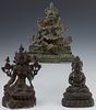 Group of Three Asian Bronze Buddha Figures, 19th c., one of an erotic nature on a stepped lotus throne; two on a double lotus throne...