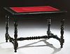 French Ebonized Mahogany Louis Philippe Style Writing Table, c. 1870, the rounded edge gilt tooled red leather inset stepped top ove...