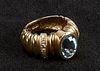 14k Ladies Ring with blue stone and Diamonds