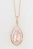 Lady's 14K Rose Gold Pendant, with a pear-shaped 4.72 carat morganite, atop a conforming border of small round diamonds and an undul...