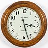 A Seth Thomas Oak Thirty Day Gallery Clock