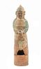 * A Sancai Glazed Pottery Figure of an Attendant Height 21 x width 5 1/2 inches.