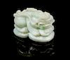 * A Carved Jadeite Toggle Length 2 3/8 inches.