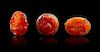 * A Group of Three Carved Carnelian Articles Height of largest 2 inches.