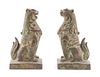* A Pair of Bronze Guardian Figures Height 8 x width 3 1/2 inches.