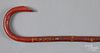 Red and yellow painted cane, early 20th c.