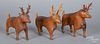 Three carved deer, early 20th c.