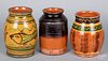 Three Shooner redware jars