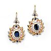 A 18K two-color gold, ruby, sapphire and diamond pendant earrings