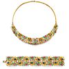 A 18K yellow gold, emerald, ruby, sapphire, colored and uncolored gemstone demi parure