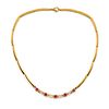 A 18K yellow gold, diamond and ruby necklace