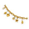 A 18K yellow gold and mabè pearl charms bracelet