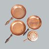 Lot of 3 pans and kitchen element. 20th century. Made of metal with copper bath. With wooden handles.