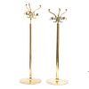 Lot of four coat racks. 20th century. For dining room service. Made in golden brass. With smooth cylindrical shafts.
