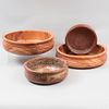 Lot of 4 salad bowls. Twentieth century. Circular design. Made of turned wood. Decorated with ribbed elements.