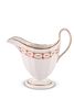 A NEW HALL CREAM JUG
 circa 1790
 Of faceted helm