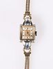 A VINTAGE MOVADO LADY'S WRIST WATCH WITH 9 CARAT 